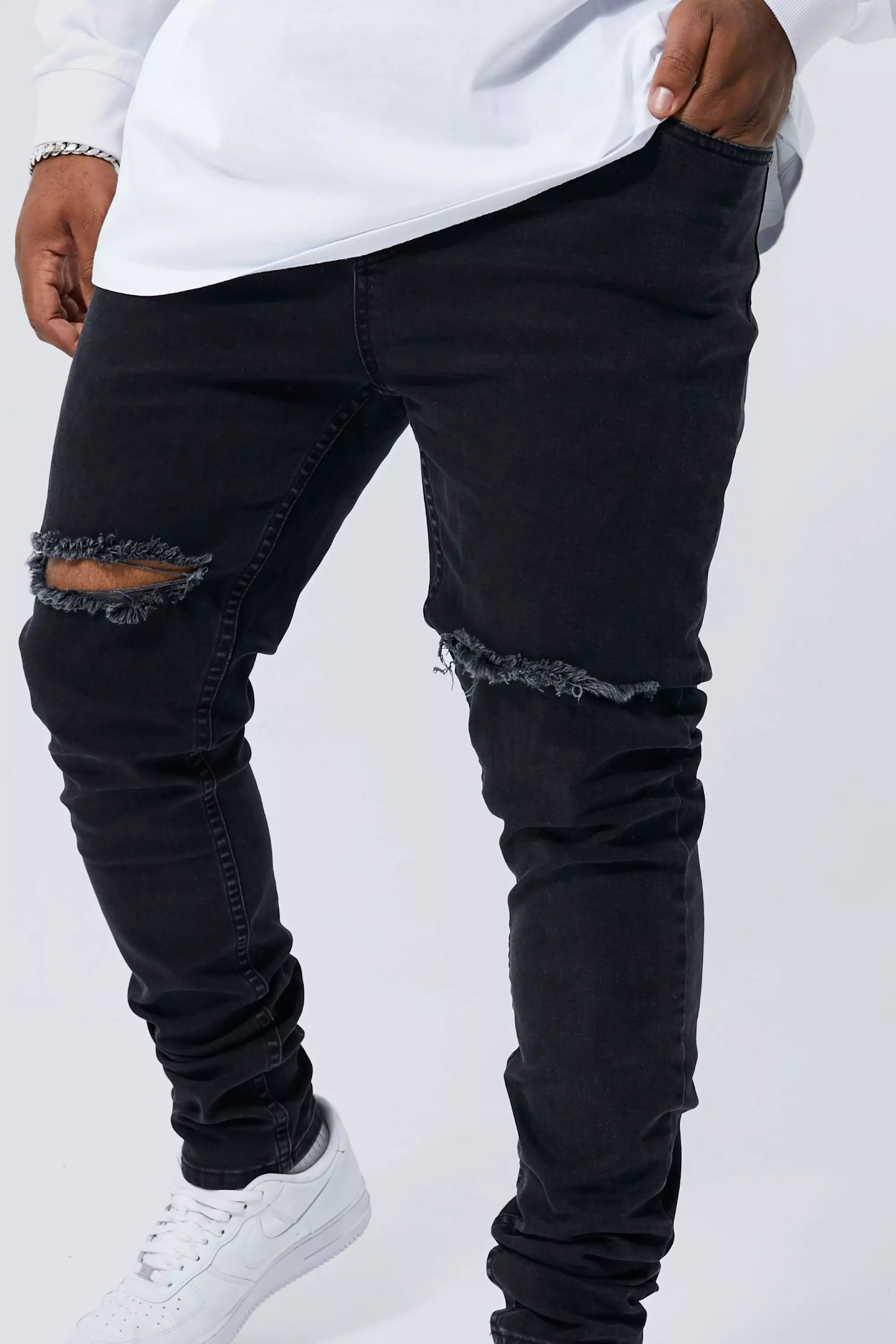 Black ripped knee outlet jeggings